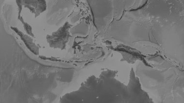 Patterson silindirik projeksiyonunda dünyanın gri ölçekli yükseklik haritasının arka planında Banda Denizi bölgesi