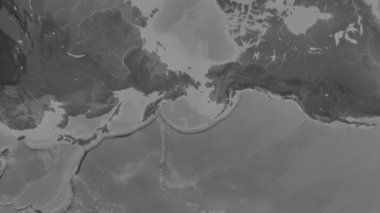 Patterson silindirik projeksiyonunda Dünya 'nın gri ölçekli yükseklik haritasının arka planında Bering Denizi bölgesi