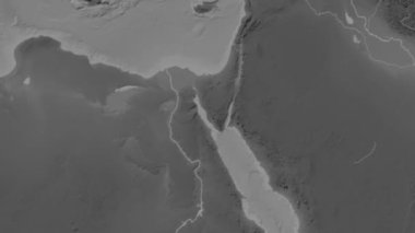 Süveyş Körfezi Bölgesi Patterson silindirik projeksiyonunda dünyanın gri ölçekli yükselme haritasının arka planında