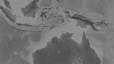 Patterson silindirik projeksiyonunda dünyanın gri ölçekli yükseklik haritasının arka planında Timor Denizi bölgesi
