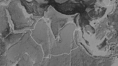 Hint tektonik plakasının alanı, Eckert III projeksiyonunda gri tonlama yükseklik haritasında katı bir çizgi ile işaretlenmiş.