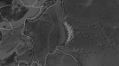 Area of the Mariana tectonic plate marked with a dashed line against the background of a darkened grayscale elevation map in the Eckert III projection clipart