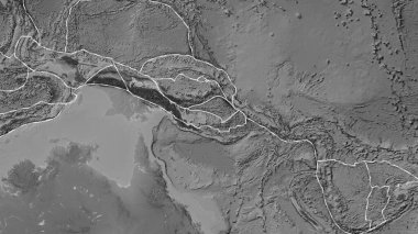 Area of the Solomon Sea tectonic plate marked with a solid line on a grayscale elevation map in the Eckert III projection clipart