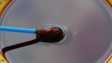 Iodine at the cotton bud