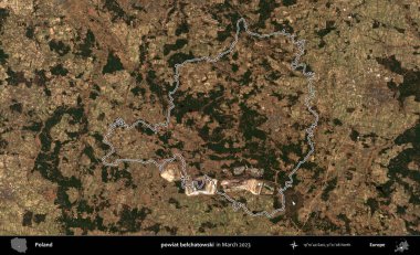 powiat belchatowski. Polonya 'nın idari bölgesinin ana hatları, Mart 2023' te çekilen Kopernik Nöbetçi karolarından oluşan bir uydu görüntüsü üzerine çizildi.