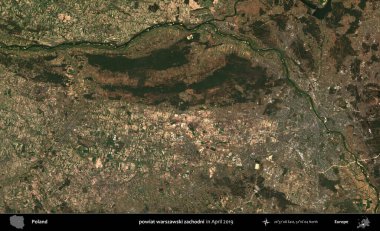 powiat warszawski zachodni. Nisan 2019 'da çekilen Kopernik Sentinel karolarından oluşan bir uydu görüntüsü üzerine Polonya' nın idari bölgesi