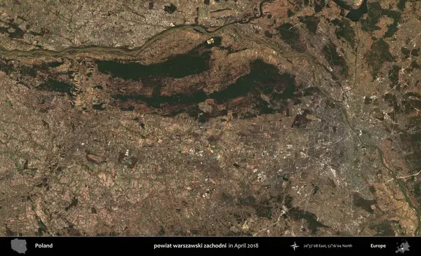 powiat warszawski zachodni. Nisan 2018 'de çekilen Kopernik Sentinel karolarından oluşan bir uydu görüntüsü üzerine Polonya' nın idari bölgesi