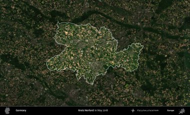 Kreis Herford. Mayıs 2018 'de çekilen Kopernik Nöbetçi karolarından oluşan koyu renkli bir uydu görüntüsü, Almanya' nın idari alanının altını çizdi ve özetledi.