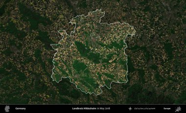 Landkreis Hildesheim. Mayıs 2018 'de çekilen Kopernik Nöbetçi karolarından oluşan koyu renkli bir uydu görüntüsü, Almanya' nın idari alanının altını çizdi ve özetledi.