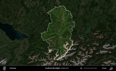 Landkreis Oberallgau. Mayıs 2017 'de çekilen Kopernik Nöbetçi karolarından oluşan koyu renkli bir uydu görüntüsü Almanya' nın idari alanının altını çizdi ve özetledi.