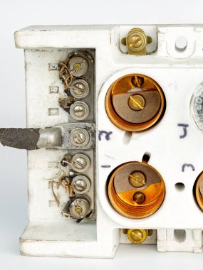 Outdated antique fuse box with empty sockets