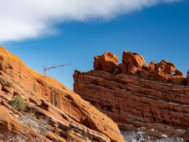 Rock crane in Red Rocks Colorado winter clipart