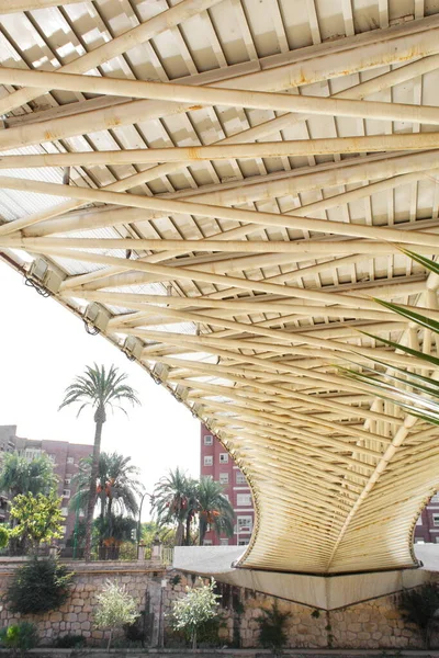 stock image Metal structure of a modern bridge with a useful design to support the weight of people crossing the river