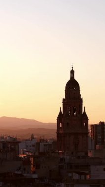 Sunset in Murcia with the cathedral tower in the background