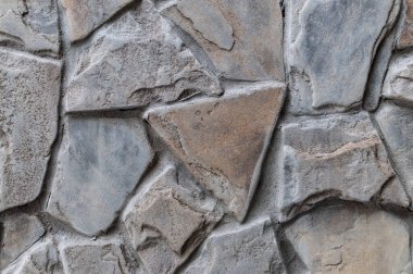 Gray stone background. Textured rough surface.