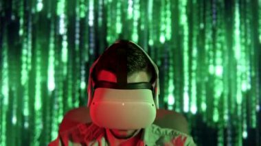 young man with virtual glasses looking ahead futuristic background. High quality 4k footage