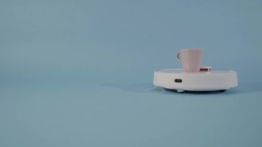 Robot vacuum cleaner serve coffe . High quality 4k footage