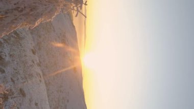 drone fly between frozen trees at sunset bulgaria nature. High quality FullHD footage