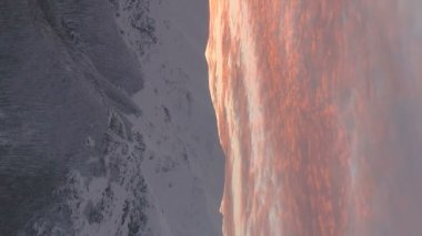 magical winter mountain sunrise at botev peak Bulgaria vertical video. High quality FullHD footage