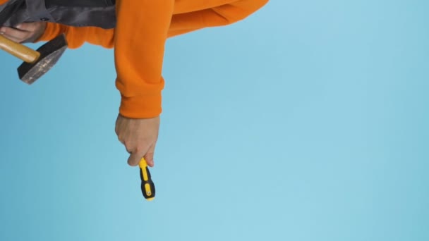 Vertical Video Repairman Industrial Work Clothes Handing Yellow Screwdriver Copy — 비디오