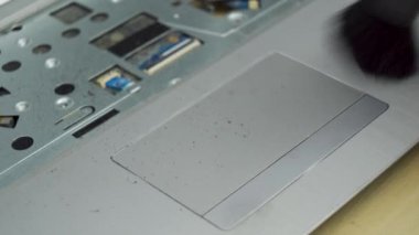 removing dust cleaning with brush Concept for laptop device repair. High quality 4k footage