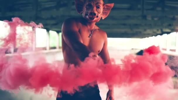 Strong Muscular Frightening Man Wearing Terrifying Pig Mask Industrial Background — Stockvideo