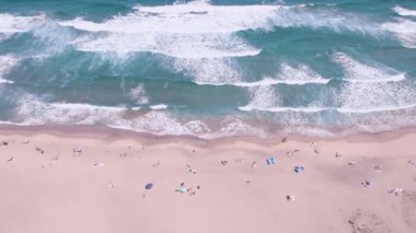 Sun, Sand, and Waves, captures the fun and upbeat nature of summer with ocean waves. It creates a fun and upbeat introduction for travel, lifestyle, and adventure videos. High quality 4k footage