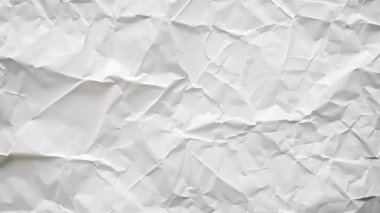 Beyaz buruşmuş kağıt dokusu hareketsiz döngüyü durdurur. Yüksek kalite 4k görüntü