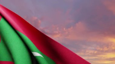 Maldivler 'in gururunu ve birliğini simgeleyen muhteşem bir günbatımına karşı Maldivler bayrağı zarif bir şekilde dalgalanıyor. Maldivler 'in kültürünü ve ulusal gururunu kutlamak için ideal.