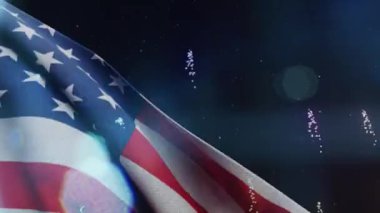 Amerikan bayrağı canlı havai fişekler arasında gururla dalgalanıyor. Gaziler Günü 'nü anmak için 