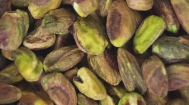  Temiz, genel bir görüntü kabuksuz bir yığın fıstığı gösteriyor, yemek geçmişi ya da sağlık kavramları için ideal..