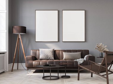 Oturma odasının içinde üç büyük beyaz çerçeve ve üç boyutlu resimler var..