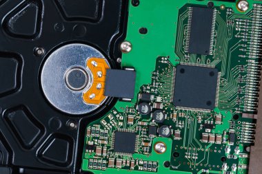 View above of the printed circuit board of a computer hard drive. Close up