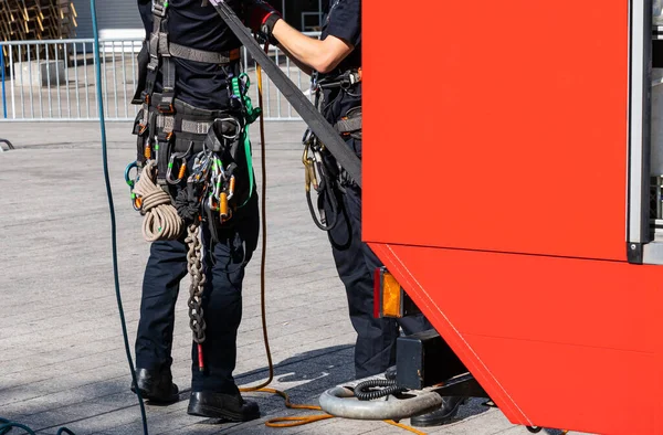 Equipment for work at height on a firemans belt.