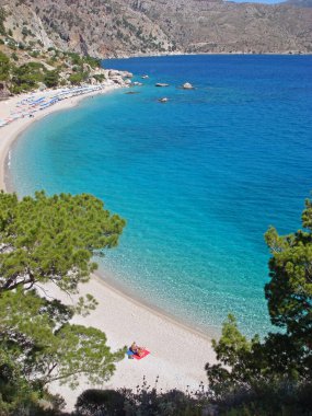 Yunanistan 'ın Karpathos kenti, 2 Temmuz Pazartesi günü Yunanistan' da yaz tatillerinde muhteşem ada gezisi arka plan duvar kâğıdı ürünlerini araştırıyoruz.