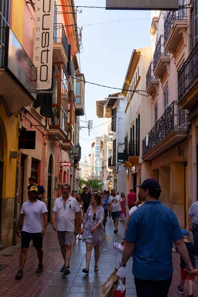 stock image Palma, Mallorca, Balearic Islands, Spain. July 21, 2022 - San Miguel street, narrow pedestrian shopping street, in the old town, busy with people walking and shopping