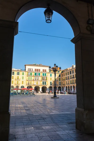 stock image Palma, Mallorca, Balearic Islands, Spain. July 21, 2022 - Arche under the buildings of the Plaza Mayor in Palma, the main square surrounded by arcades