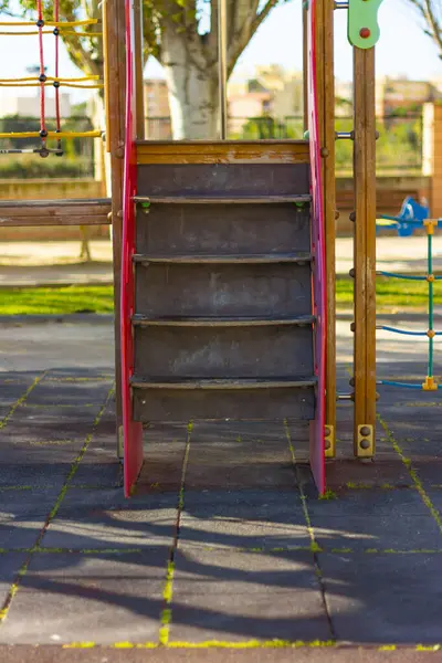 Steps leading up to a playground installation