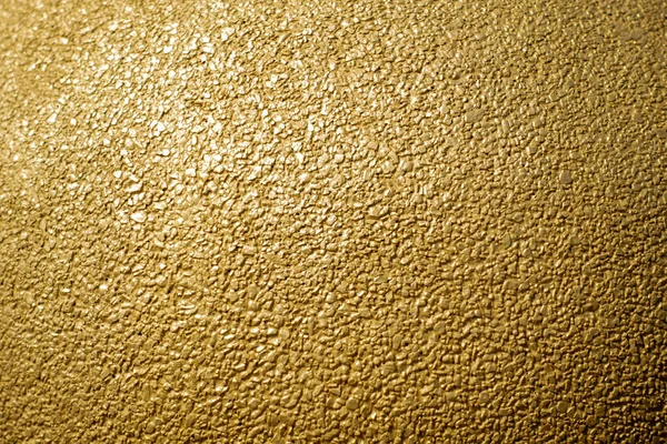 Gold concrete wall texture or background  and copy space
