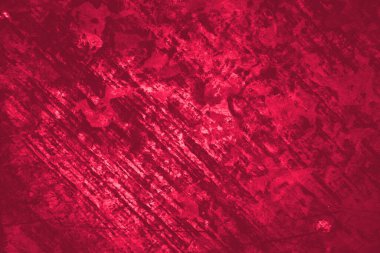 Black red rough surface. vintage grunge background texture for design. , Viva magenta color. Trend 2023. Close-up. background 