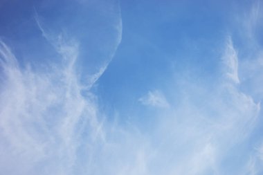 Fantastic soft white clouds against blue sky and copy space horizontal shape