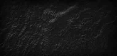 Dark gray black slate stone background or texture, horizontal shape with space for design. Web banner. Wide. Panoramic. Website header