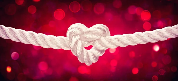 Corda Branca Com Forma Coração Fundo Bokeh Vermelho Amarrar Casamento — Fotografia de Stock