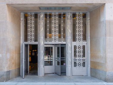 Art deco entrance of a federal office building in lower Manhattan, New York City with no people