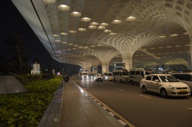 Beautiful exteriors of Mumbai International airport during night also called Chhatrapati Shivaji International Airport clipart