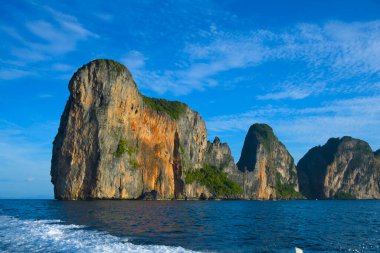 Limestone cliff formation of Maya bay near phi phi island Thailand clipart