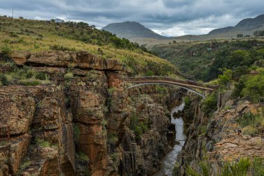 Bourke's Luck Potholes in Graskop, Mpumalanga - geological attraction formed by water erosion clipart