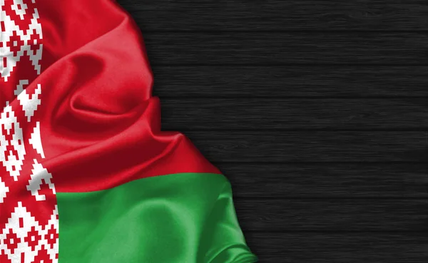 Fechar Bandeira Bielorrússia Topo Fundo Madeira Preta — Fotografia de Stock