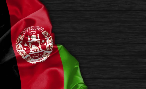 Zbliżenie Afgańskiej Flagi Szczycie Czarnego Drewnianego Tła — Zdjęcie stockowe
