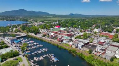 Magog city aerial view at the mouth of Magog River to Lake Memphremagog, Magog, Memphremagog County, Quebec QC, Canada. 